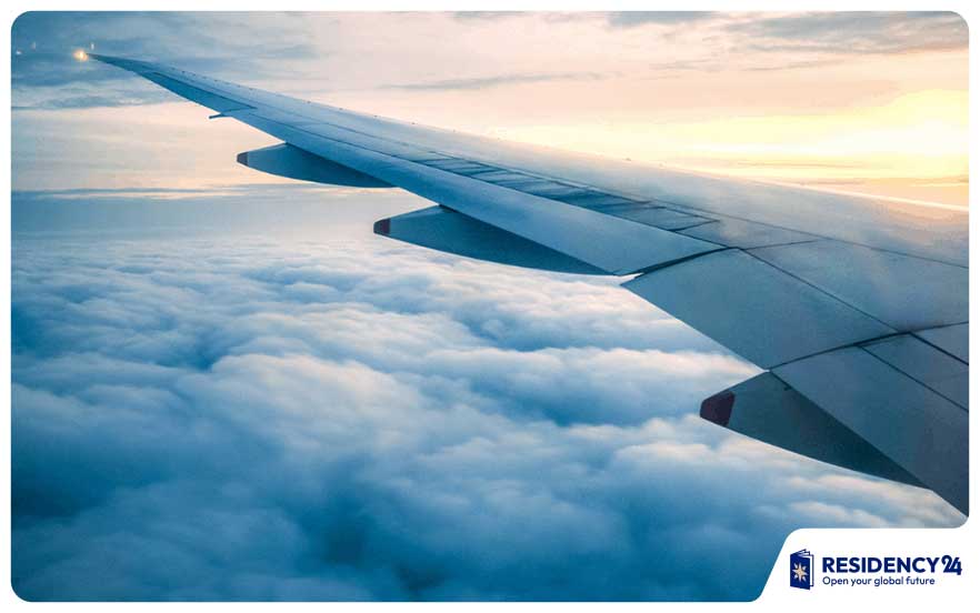 airplane window travel sky view