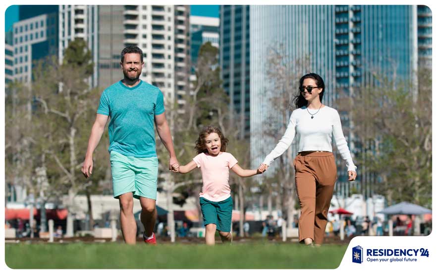 family-walking-in-Dubai-neighborhood-park.jpg